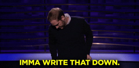 Notes Write That Down GIF by Team Coco – FSM – Digital Marketing Agency Man bending over to write on a desk, with bold yellow caption reading 'Imma write that down'.
